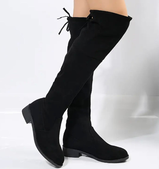Knee high black boots